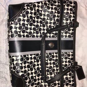 Lightly used original style coach purse